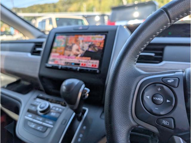 フリード クロスター 天井モニター/大型ナビフルセグTVバックカメラブルートゥース/衝突軽減ブレーキサポート/前後ミラー型ドラレコ/両側パワースライドドア/リヤフィルム施工済み/クラッツィオ黒革調カバー/両席シートヒーター(14枚目)