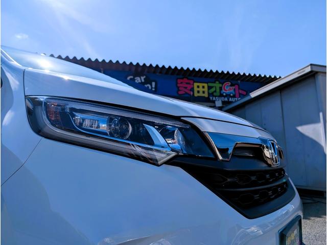 フリード クロスター 天井モニター/大型ナビフルセグTVバックカメラブルートゥース/衝突軽減ブレーキサポート/前後ミラー型ドラレコ/両側パワースライドドア/リヤフィルム施工済み/クラッツィオ黒革調カバー/両席シートヒーター(15枚目)