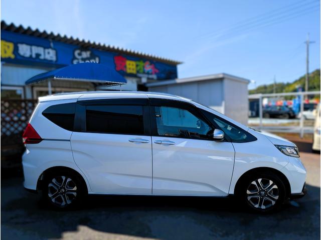 フリード クロスター 天井モニター/大型ナビフルセグTVバックカメラブルートゥース/衝突軽減ブレーキサポート/前後ミラー型ドラレコ/両側パワースライドドア/リヤフィルム施工済み/クラッツィオ黒革調カバー/両席シートヒーター(18枚目)