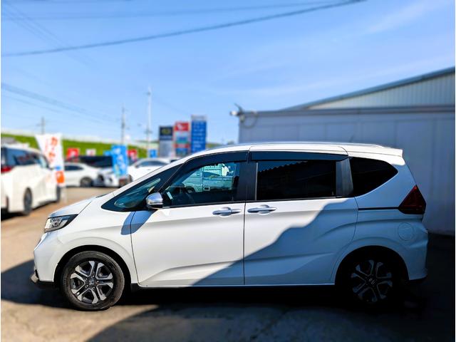 フリード クロスター 天井モニター/大型ナビフルセグTVバックカメラブルートゥース/衝突軽減ブレーキサポート/前後ミラー型ドラレコ/両側パワースライドドア/リヤフィルム施工済み/クラッツィオ黒革調カバー/両席シートヒーター(23枚目)