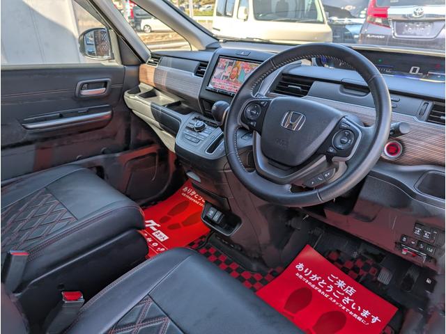 フリード クロスター 天井モニター/大型ナビフルセグTVバックカメラブルートゥース/衝突軽減ブレーキサポート/前後ミラー型ドラレコ/両側パワースライドドア/リヤフィルム施工済み/クラッツィオ黒革調カバー/両席シートヒーター(26枚目)