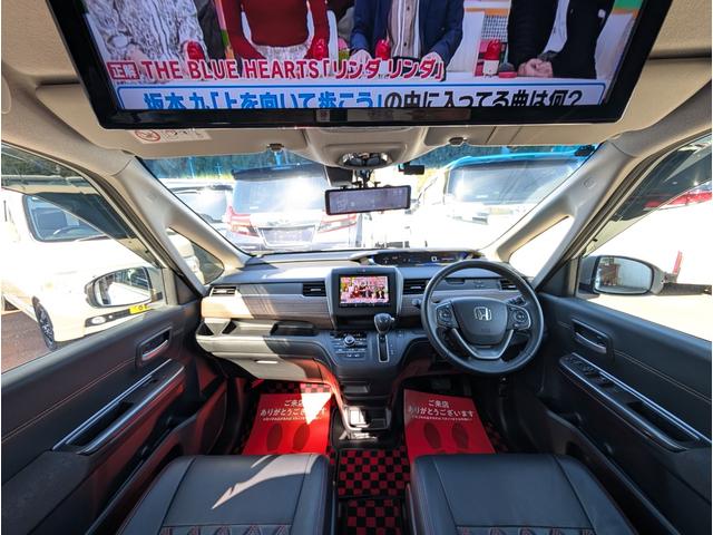フリード クロスター 天井モニター/大型ナビフルセグTVバックカメラブルートゥース/衝突軽減ブレーキサポート/前後ミラー型ドラレコ/両側パワースライドドア/リヤフィルム施工済み/クラッツィオ黒革調カバー/両席シートヒーター(27枚目)