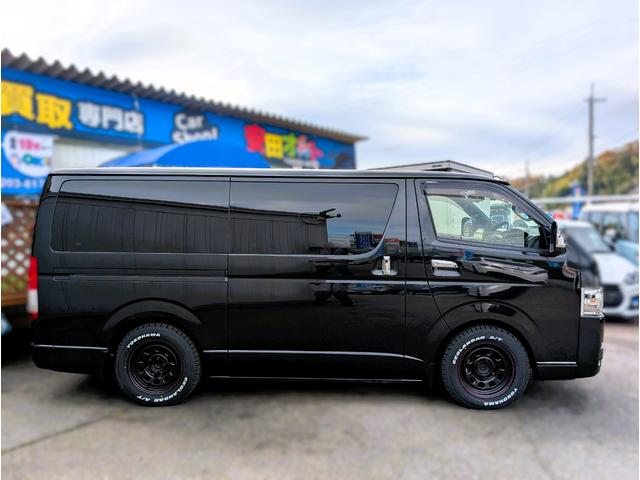 ハイエースバン スーパーＧＬ　ダークプライムＩＩ　フリップダウン　大型ナビ　デイトナホイール　新品ジオランダーホワイトレター　全方位モニター　両側パワースライド　デジタルミラー　リヤフィルム施工　衝突軽減ブレーキ　ハーフレザーシート　純正ホイール（19枚目）