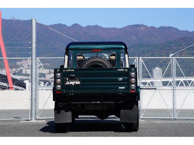 ディフェンダー ピックアップ　ＡＴ載替車両　ＮＯＸ／ＰＭ適合車　本革シート張替済　社外ステアリング　社外１０インチディスプレイオーディオ　専用ビルトインキッド取付　サイドステップブラック　社外グリル　ＬＥＤサイドランプ（7枚目）
