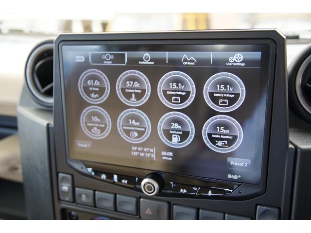 ディフェンダー ピックアップ　ＡＴ載替車両　ＮＯＸ／ＰＭ適合車　本革シート張替済　社外ステアリング　社外１０インチディスプレイオーディオ　専用ビルトインキッド取付　サイドステップブラック　社外グリル　ＬＥＤサイドランプ（21枚目）