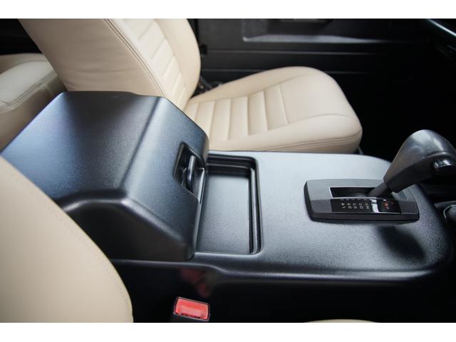 ディフェンダー ピックアップ　ＡＴ載替車両　ＮＯＸ／ＰＭ適合車　本革シート張替済　社外ステアリング　社外１０インチディスプレイオーディオ　専用ビルトインキッド取付　サイドステップブラック　社外グリル　ＬＥＤサイドランプ（23枚目）