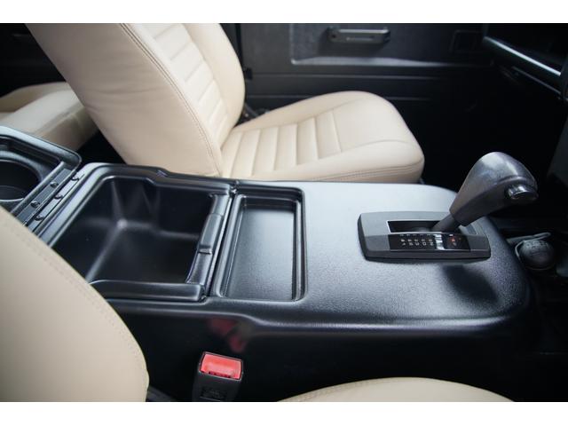 ディフェンダー ピックアップ　ＡＴ載替車両　ＮＯＸ／ＰＭ適合車　本革シート張替済　社外ステアリング　社外１０インチディスプレイオーディオ　専用ビルトインキッド取付　サイドステップブラック　社外グリル　ＬＥＤサイドランプ（24枚目）