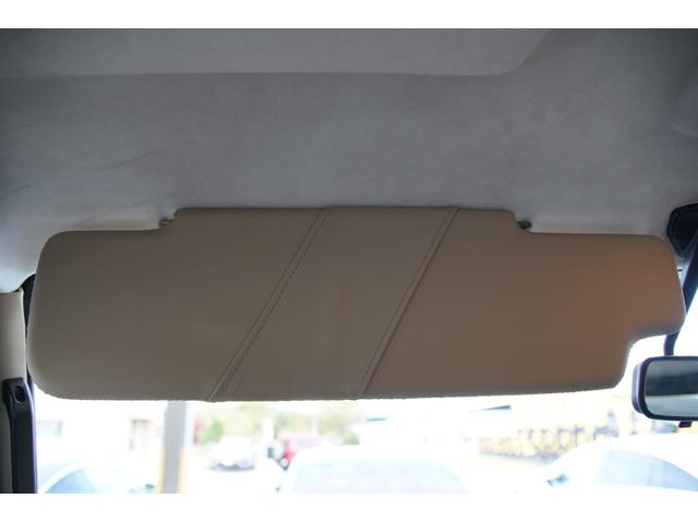 ディフェンダー ピックアップ　ＡＴ載替車両　ＮＯＸ／ＰＭ適合車　本革シート張替済　社外ステアリング　社外１０インチディスプレイオーディオ　専用ビルトインキッド取付　サイドステップブラック　社外グリル　ＬＥＤサイドランプ（26枚目）