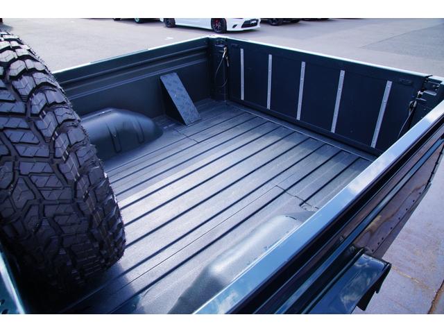 ディフェンダー ピックアップ　ＡＴ載替車両　ＮＯＸ／ＰＭ適合車　本革シート張替済　社外ステアリング　社外１０インチディスプレイオーディオ　専用ビルトインキッド取付　サイドステップブラック　社外グリル　ＬＥＤサイドランプ（46枚目）