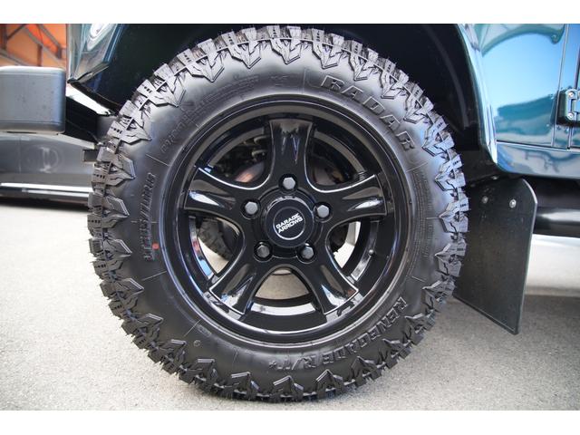 ディフェンダー ピックアップ　ＡＴ載替車両　ＮＯＸ／ＰＭ適合車　本革シート張替済　社外ステアリング　社外１０インチディスプレイオーディオ　専用ビルトインキッド取付　サイドステップブラック　社外グリル　ＬＥＤサイドランプ（57枚目）