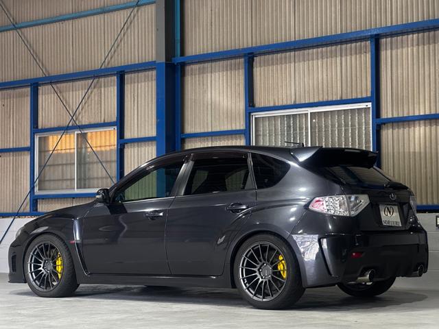 インプレッサ ＷＲＸ　ＳＴｉ　エンケイ１８インチ　ＴＥＩＮ車高調　アペックスマフラー　ＳＴＩスポイラー　シムスレーシングリアバンパー　Ｐａｎａｓｏｎｉｃフローティングナビ　フルセグ　ＨＩＤ　クリフォード　タイベル交換済み（8枚目）