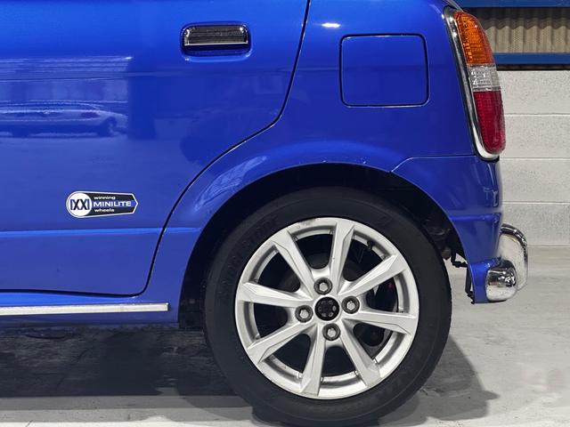 ミラジーノ ミニライトスペシャルターボ　４ＷＤ　ターボ　５ＭＴ　車高調　社外ステアリング　社外１４インチＡＷ　ＥＴＣ　キセノンライト（9枚目）