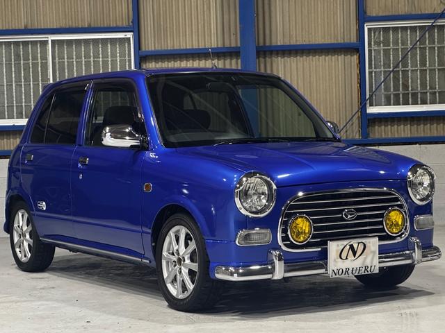 ミラジーノ ミニライトスペシャルターボ　４ＷＤ　ターボ　５ＭＴ　車高調　社外ステアリング　社外１４インチＡＷ　ＥＴＣ　キセノンライト（12枚目）