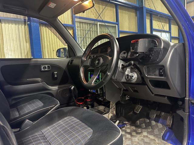 ミラジーノ ミニライトスペシャルターボ　４ＷＤ　ターボ　５ＭＴ　車高調　社外ステアリング　社外１４インチＡＷ　ＥＴＣ　キセノンライト（17枚目）