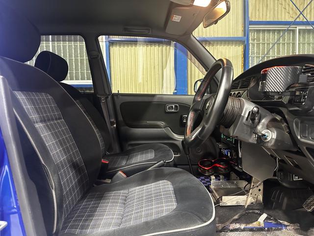 ミラジーノ ミニライトスペシャルターボ　４ＷＤ　ターボ　５ＭＴ　車高調　社外ステアリング　社外１４インチＡＷ　ＥＴＣ　キセノンライト（18枚目）