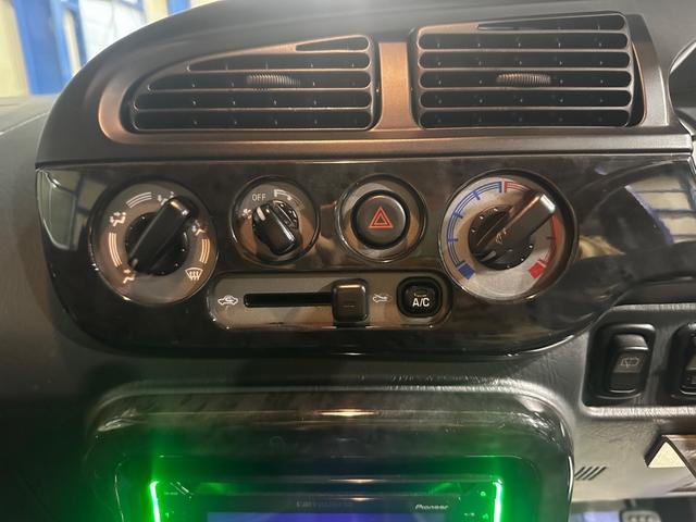 ミラジーノ ミニライトスペシャルターボ　４ＷＤ　ターボ　５ＭＴ　車高調　社外ステアリング　社外１４インチＡＷ　ＥＴＣ　キセノンライト（21枚目）