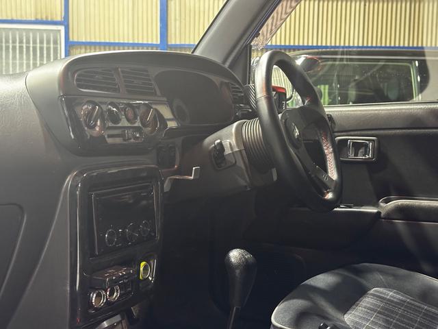 ミラジーノ ミニライトスペシャルターボ　４ＷＤ　ターボ　５ＭＴ　車高調　社外ステアリング　社外１４インチＡＷ　ＥＴＣ　キセノンライト（32枚目）