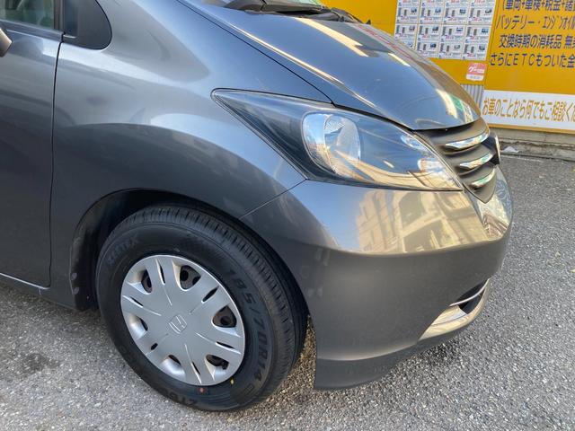 フリード Ｇ　ハイウェイエディション　タイヤ４本新品　フリップダウンモニター　ナビ　バックカメラ　ＥＴＣ　前後ドライブレコーダー　キーレス　片側パワースライドドア　７人乗り（22枚目）