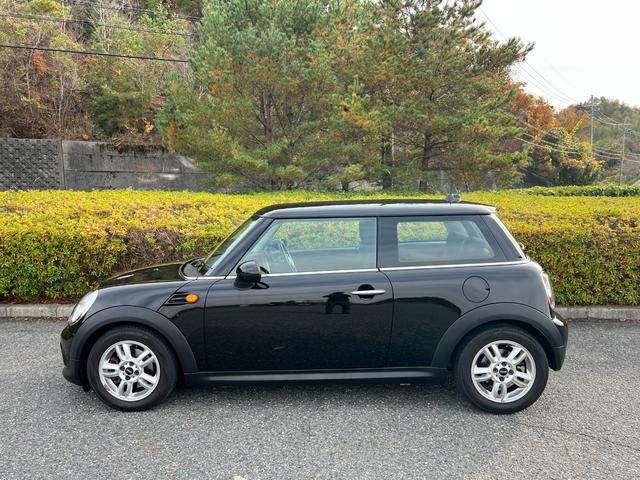 ＭＩＮＩ ワン　プッシュスタート　パナソニックナビ　地デジＴＶ　Ｂｌｕｅｔｏｏｔｈ　キーレス　１５インチ純正アルミホイール　禁煙車（7枚目）
