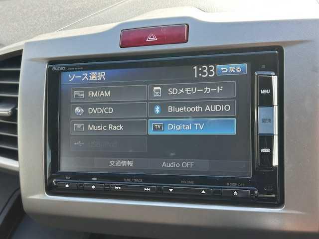 フリード Ｇ　ジャストセレクション　１オーナー車　純正ナビ・フルセグＴＶ　バックカメラ　両側電動スライドドア　純正フリップダウンモニター　ドライブレコーダー　ビルトインＥＴＣ　スマートキー　ステアリングリモコン（7枚目）