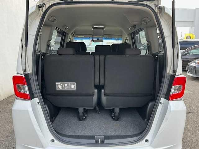 フリード Ｇ　ジャストセレクション　１オーナー車　純正ナビ・フルセグＴＶ　バックカメラ　両側電動スライドドア　純正フリップダウンモニター　ドライブレコーダー　ビルトインＥＴＣ　スマートキー　ステアリングリモコン（9枚目）