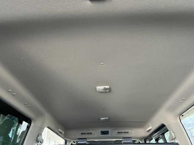 ＮＶ３５０キャラバンバン ロングプレミアムＧＸ　・ブラックギア・ワンオーナー車・社外９インチフローティングナビ・ベットキット・アラウンドビューモニター・ホワイトレター・ローダウン・ドライブレコーダー・左側パワースライドドア・ＬＥＤヘッドライト（24枚目）