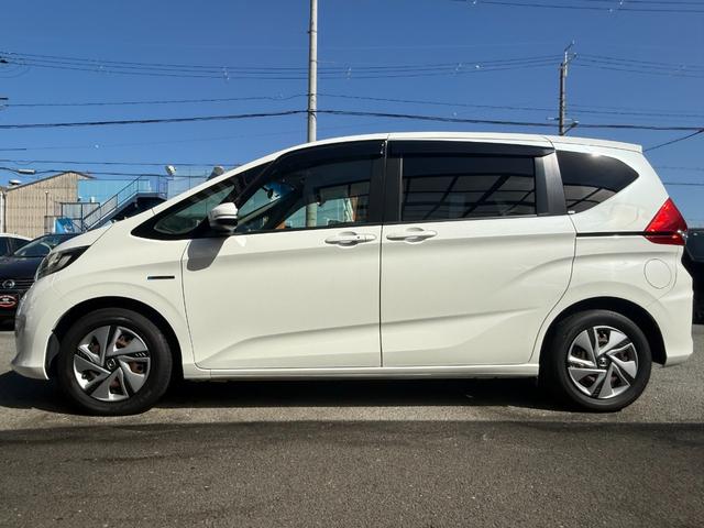 フリードハイブリッド ハイブリッド・Ｇホンダセンシング　／衝突軽減／両側パワースライドドア／９型ナビ／Ｂｌｕｅｔｏｏｔｈ／ＨＤＭＩ／バックモニター／フルセグ／ビルトインＥＴＣ／レーダークルーズ／ＬＥＤヘッドライト／オートライト／レーンキープ／ハンドルキープ（55枚目）