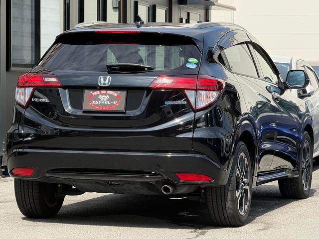 ヴェゼル ハイブリッドZ・ホンダセンシング /衝突軽減/純正ナビ/Bluetooth/バックモニター/フルセグ/ドライブレコーダー/ETC/シートヒーター/レーダークルーズ/ハーフレザーシート/LEDヘッドライト/オート格納ミラー/スマートキー(2枚目)