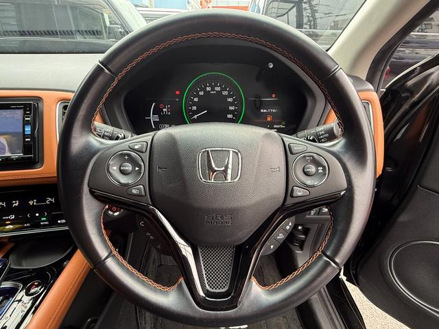 ヴェゼル ハイブリッドZ・ホンダセンシング /衝突軽減/純正ナビ/Bluetooth/バックモニター/フルセグ/ドライブレコーダー/ETC/シートヒーター/レーダークルーズ/ハーフレザーシート/LEDヘッドライト/オート格納ミラー/スマートキー(21枚目)