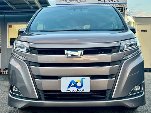 ノア ハイブリッドG 純正10インチナビ フルセグテレビ バックカメラ 衝突軽減 両側電動 スマートキー クルコン シートヒーター LEDヘッドライト フォグ 前後ドラレコ ETC 純正アルミ(2枚目)