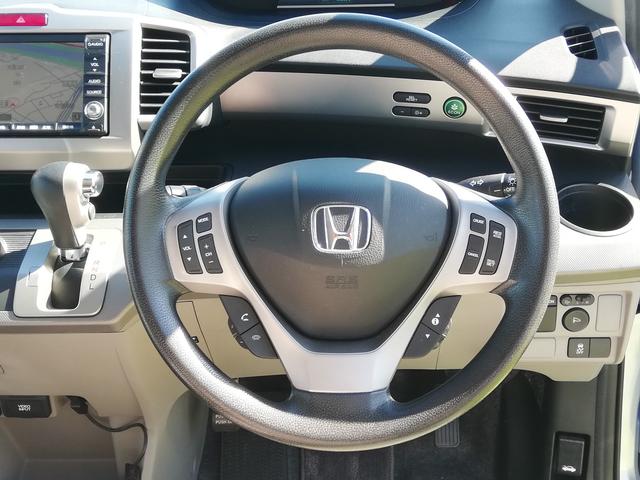 フリードハイブリッド ジャストセレクション　電動スライド／純正ナビ／純正リアモニター／バックカメラ／ＨＩＤヘッドライト／ホンダスマートキーシステム／買取車／オートライト／禁煙車（30枚目）