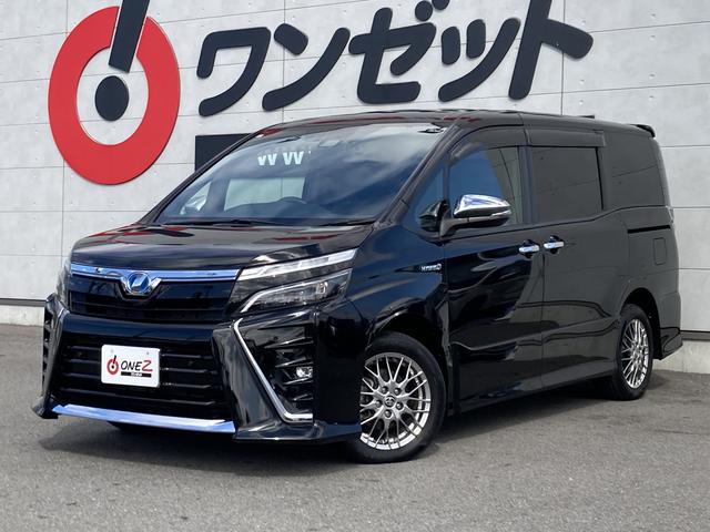 ヴォクシー ハイブリッドＺＳ　煌ＩＩ　アルパイン１１インチナビ・アルパイン１２．８インチフリップダウンモニター・セーフティセンス・両側パワースライド・ＬＥＤヘッドライト・リアオートエアコン・２列目キャプテンシート・バックモニター・前席シー（3枚目）
