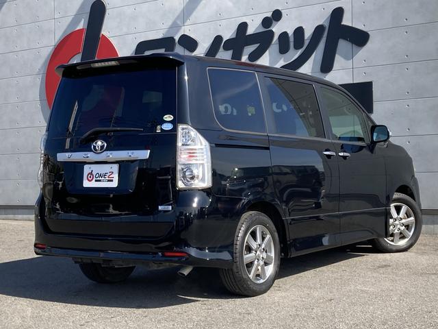 ヴォクシー ZS 煌II 純正ナビ・純正フリップダウンモニター・両側パワースライドドア・HIDヘッドライト・パドルシフト・バックモニター・ビルトインETC・革巻きステアリング・純正16インチアルミホイール・ステアリングスイッチ(13枚目)