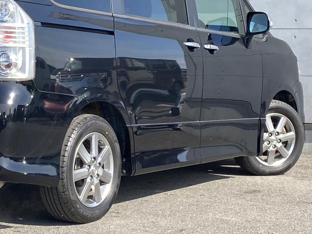 ヴォクシー ZS 煌II 純正ナビ・純正フリップダウンモニター・両側パワースライドドア・HIDヘッドライト・パドルシフト・バックモニター・ビルトインETC・革巻きステアリング・純正16インチアルミホイール・ステアリングスイッチ(14枚目)