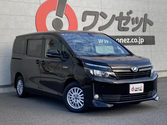 ヴォクシー ハイブリッドＶ　純正９インチナビ・純正フリップダウンモニター・クルーズコントロール・ＬＥＤヘッドライト・両側パワースライドドア・前席シートヒーター・２列目キャプテンシート・リアオートエアコン・バックモニター・スマート（2枚目）
