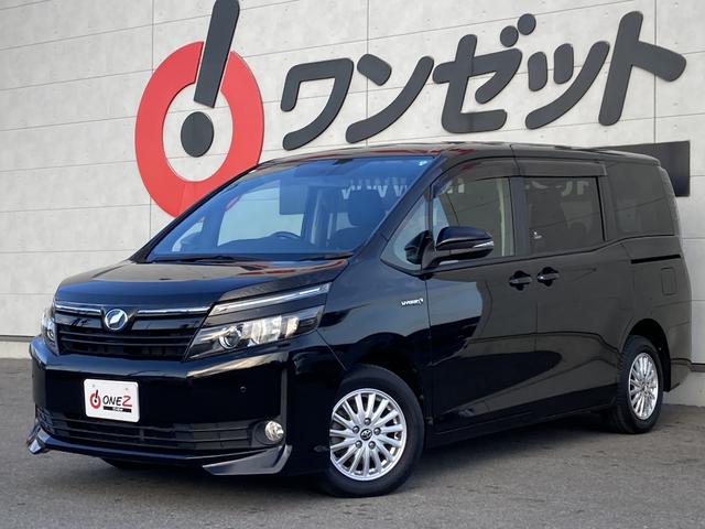 ヴォクシー ハイブリッドＶ　純正９インチナビ・純正フリップダウンモニター・クルーズコントロール・ＬＥＤヘッドライト・両側パワースライドドア・前席シートヒーター・２列目キャプテンシート・リアオートエアコン・バックモニター・スマート（3枚目）