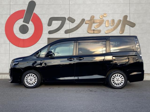 ヴォクシー ハイブリッドＶ　純正９インチナビ・純正フリップダウンモニター・クルーズコントロール・ＬＥＤヘッドライト・両側パワースライドドア・前席シートヒーター・２列目キャプテンシート・リアオートエアコン・バックモニター・スマート（18枚目）