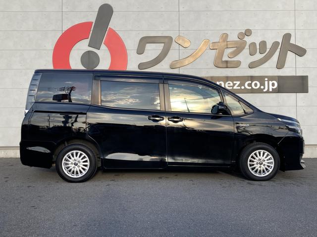 ヴォクシー ハイブリッドＶ　純正９インチナビ・純正フリップダウンモニター・クルーズコントロール・ＬＥＤヘッドライト・両側パワースライドドア・前席シートヒーター・２列目キャプテンシート・リアオートエアコン・バックモニター・スマート（19枚目）