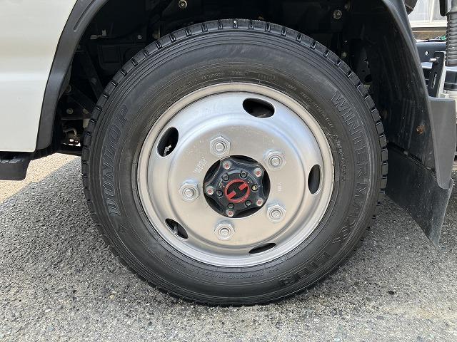 エルフトラック ４ＷＤ・２ｔ積・５ＭＴ・全低床ダンプ・中間ピン付　中間ピン　コボレーン　ＥＴＣ　左電格ミラー　アイドルアップ　左電格ミラー　坂道発進補助装置　ライトレベライザー　ドアバイザー　キーレス（38枚目）