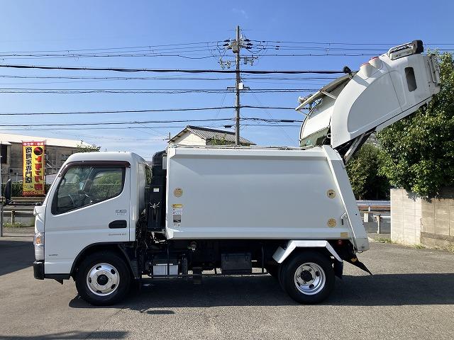 キャンター ２．３ｔ積・プレス式パッカー・５．３立米・ＡＴ　２．３ｔ積・極東製プレス式パッカー・ＧＢ５３－２７－Ｓ・５．３立米・ＡＴ・ＧＢシリーズ・汚水タンク・左電格ミラー・ＥＴＣ・バックモニター・ドアバイザー・フロアゴムマット・ライトレベライザー（11枚目）