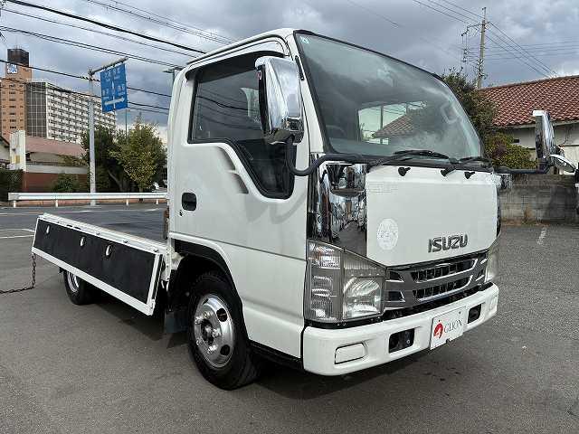 エルフトラック 2t積・5MT・10尺・平ボディ・ロープ穴3対・メッキパーツ ・2t積・5MT・10尺・平ボディ・ロープ穴3対・メッキパーツ・5t未満・車検付・坂道発進補助装置・ゲートチェーン・フォグランプ・ライトレベライザー・荷台内寸 L3123 W1616 H367(9枚目)