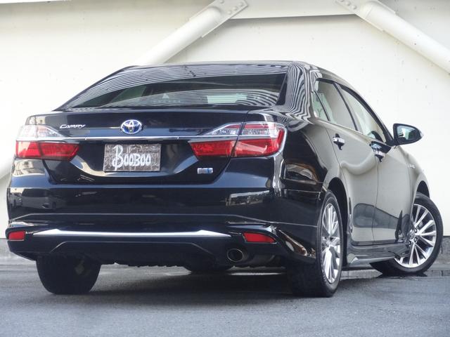 カムリ ハイブリッド Gパッケージ・プレミアムブラック サンルーフ モデリスタエアロ ハーフレザー クルコン 運転席パワーシート 純正SDナビ スマートキー 障害物センサー Pスタート 純正AW 革巻コンビハンドル バックカメラ Bluetooth(2枚目)