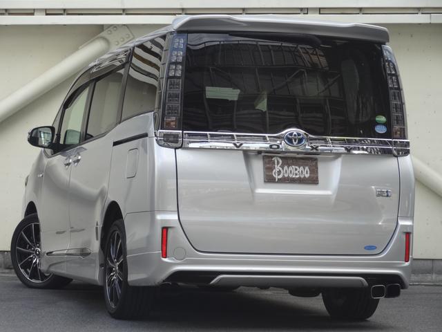 ヴォクシー ハイブリッドV フルエアロ(モデリスタ) モデリスタバンパー クルコン 両側Pスラ 10インチアルパインナビ 10.2インチ後席モニター 社外17インチAW シートヒーター スマートキー Pスタート(5枚目)