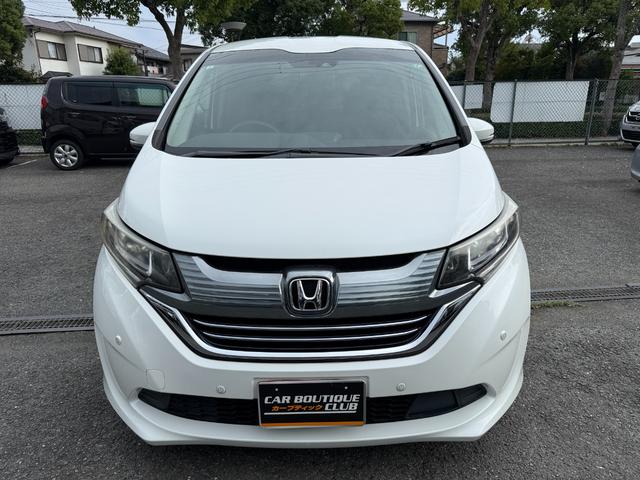 フリード+ハイブリッド 1.5ハイブリッドG車いす仕様車 両側電動スライドドア 純正ナビ ETC車載器 ドライブレコーダー バックカメラ レーダークルーズコントロール 前後ドライブレコーダー CD DVD フルセグ(3枚目)