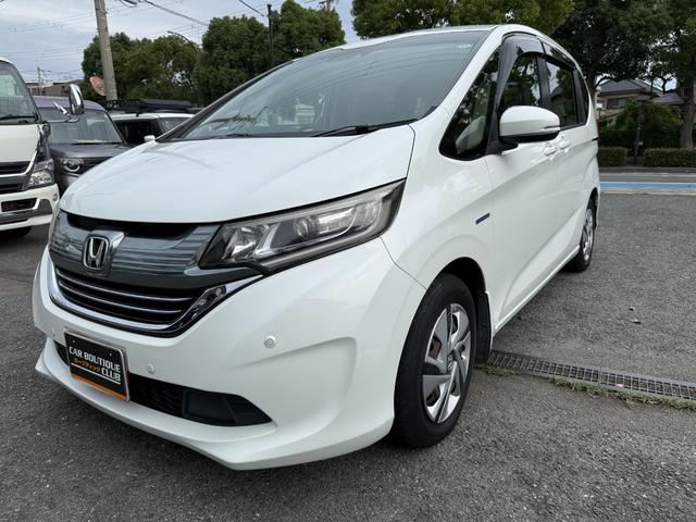 フリード+ハイブリッド 1.5ハイブリッドG車いす仕様車 両側電動スライドドア 純正ナビ ETC車載器 ドライブレコーダー バックカメラ レーダークルーズコントロール 前後ドライブレコーダー CD DVD フルセグ(4枚目)