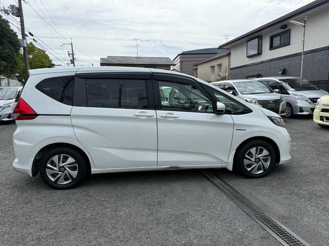 フリード+ハイブリッド 1.5ハイブリッドG車いす仕様車 両側電動スライドドア 純正ナビ ETC車載器 ドライブレコーダー バックカメラ レーダークルーズコントロール 前後ドライブレコーダー CD DVD フルセグ(9枚目)