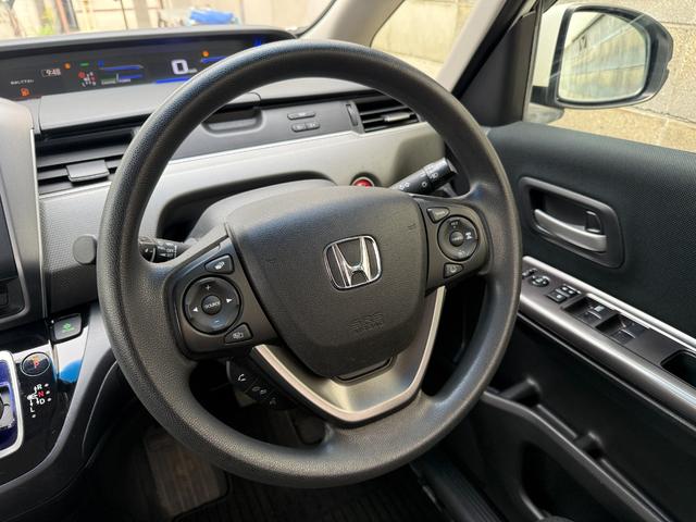 フリード+ハイブリッド 1.5ハイブリッドG車いす仕様車 両側電動スライドドア 純正ナビ ETC車載器 ドライブレコーダー バックカメラ レーダークルーズコントロール 前後ドライブレコーダー CD DVD フルセグ(27枚目)