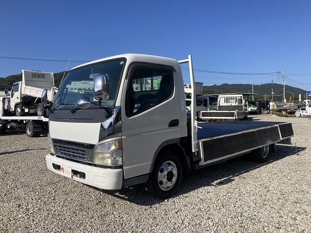 キャンター ３ｔ積・ワイドロング・平・５ＭＴ　３ｔ積　ワイドロング　平☆５ＭＴ　荷台後方リフト装置　歩み掛け　荷台鉄板張り　ゲートチェーン　５方開　アシストゲート　メッキパーツ　荷台内寸　Ｌ４３６５　Ｗ１９８３　Ｈ３８１（9枚目）