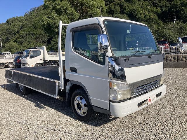 キャンター ３ｔ積・ワイドロング・平・５ＭＴ　３ｔ積　ワイドロング　平☆５ＭＴ　荷台後方リフト装置　歩み掛け　荷台鉄板張り　ゲートチェーン　５方開　アシストゲート　メッキパーツ　荷台内寸　Ｌ４３６５　Ｗ１９８３　Ｈ３８１（10枚目）