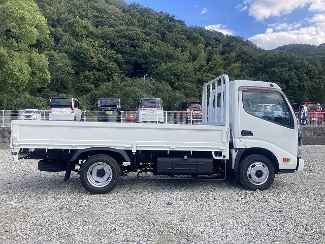 ダイナトラック 2t積・セミロング・平ボディ・AT車 2t積・セミロング・平ボディ・AT車・プリクラッシュセーフティ・車線逸脱警報装置・イクリプスナビ・ETC・床フック2対・サポートゲート・スチール横ネタ・荷台内寸 L3566 W1608 H361(5枚目)